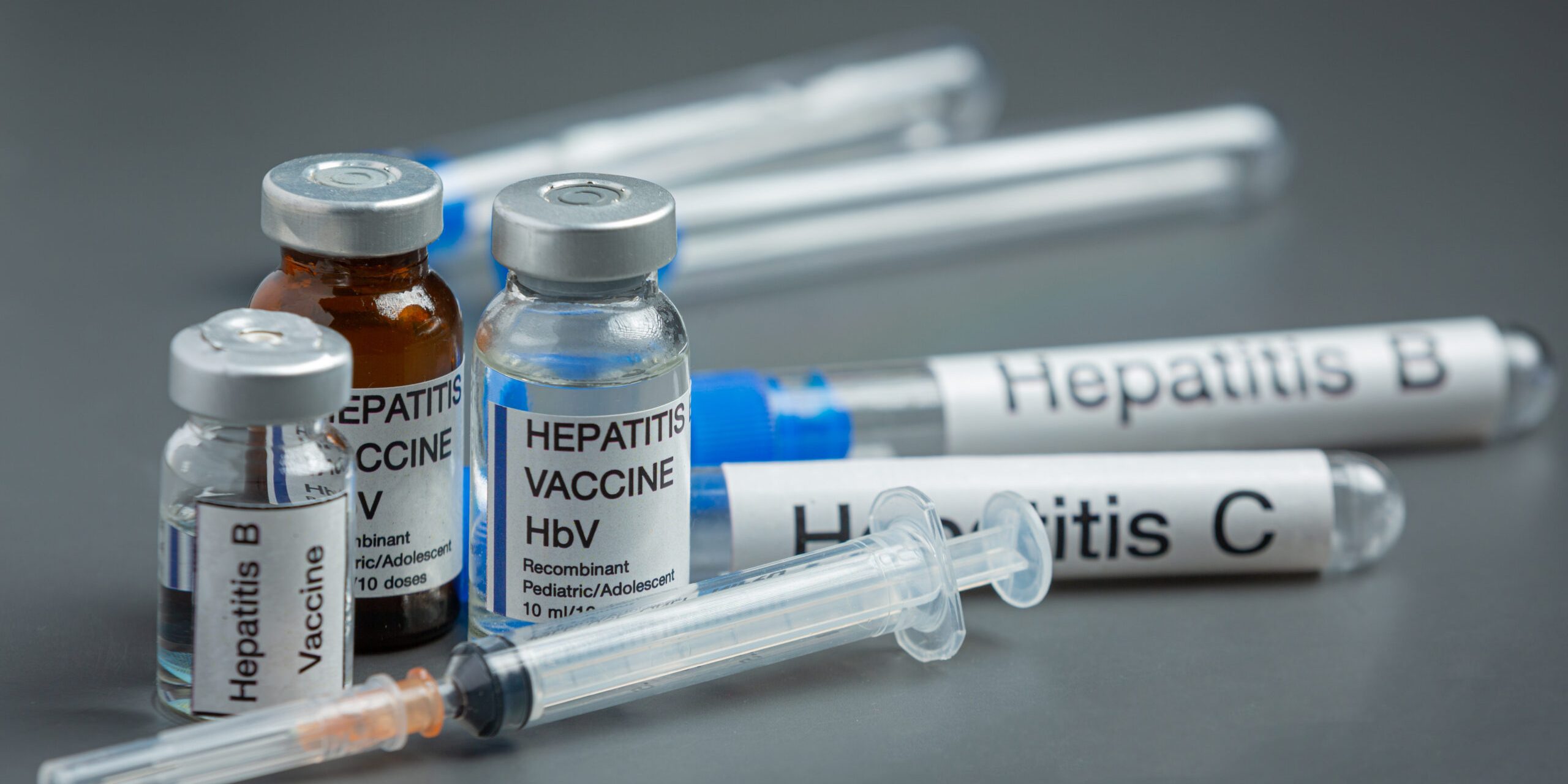 world hepatitis day concept with medical tools and pills placed Hepatitis